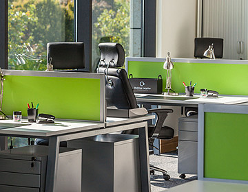 image of a clean office with desks and computers